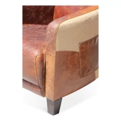 пара клубных кресел из коричневой кожи и прочного холста