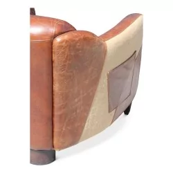 пара клубных кресел из коричневой кожи и прочного холста