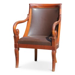 Mahogany gondola chair covered in brown leather. As is