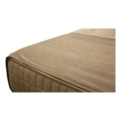 Handmade bed runner in beige.