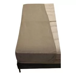 Handmade bed runner in beige.