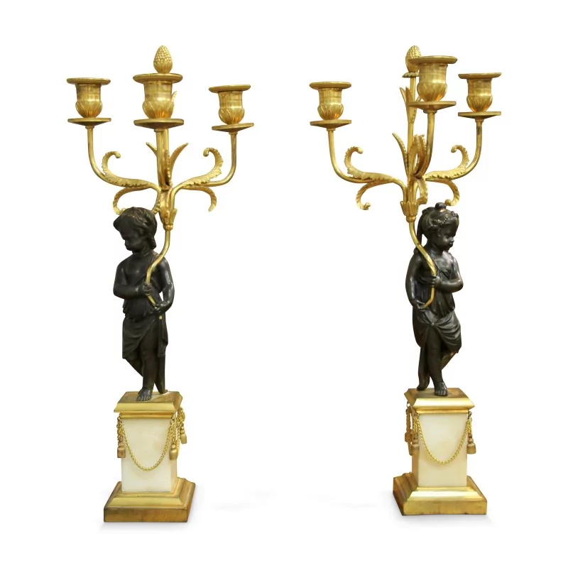 Pair of Louis XVI \"Aux putti\" candelabras in the style of Jacques-Francois-Joseph Saly - Moinat - Candleholders, Candlesticks