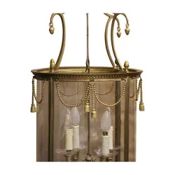 Lanterne "Aux clochettes" Louis XVI en laiton dorée, quatre lumières.