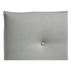 Tête de lit "Pillow" recouvert d un tissu vert, garnissage en plumes et boutons capitonnés