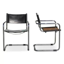 Pair of \"Le Corbusier\" armchairs with chrome-plated metal frame and black leather seat and backrest