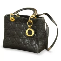 Сумка \"Christian Dior\" из черной кожи с принтом \"каннаж\".