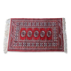 Afghan rug. Colours: black, red and white.