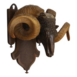 \"Ram s head\" in carved wood and Brienz horns.