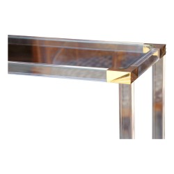 Console en plexiglas, plateau verre et angle en laiton.