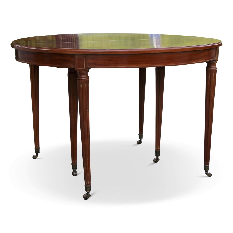Table Louis XVI en acajou comprenant deux rallonges avec ceintures. - Moinat - Tables de salle à manger
