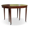 Table Louis XVI en acajou comprenant deux rallonges avec ceintures. - Moinat - Tables de salle à manger