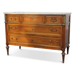 Louis XVI style mahogany commode adorned with bronze. Marble top. 5 drawers.
