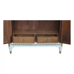 Une armoire Louis XVI Napoléon III modèle "Jansen" sculptée "Aux raisins"