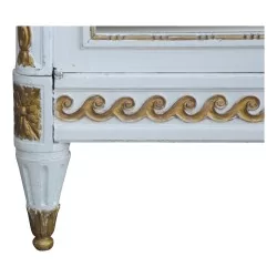 Une armoire Louis XVI Napoléon III modèle "Jansen" sculptée "Aux raisins"