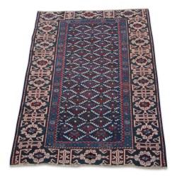 Tapis noué en laine.