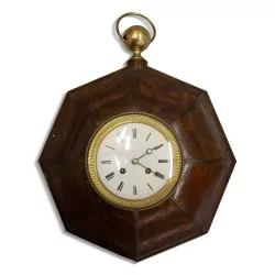 Pendule "Oeil de boeuf", coloris marron.