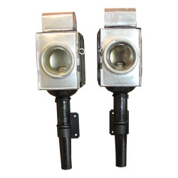 Pair of "Carèche" lanterns with wall bracket.