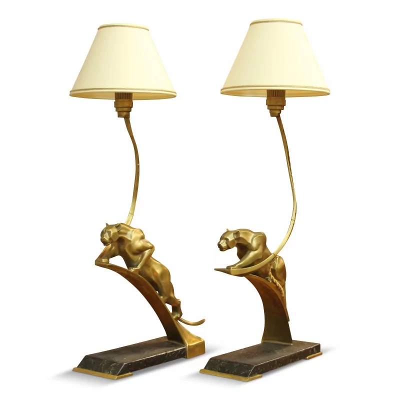 Ein Paar "Jaguar"-Lampen aus Bronze mit Porzellanfüßen im Art-Deco-Stil. - Moinat - Dekorationszubehör