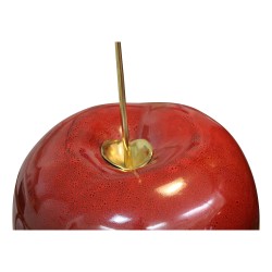 Cerise en porcelaine et tige bronze doré.