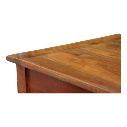 Table de salle à manger en noyer avec un tiroir. Pieds cannelés et tournés.