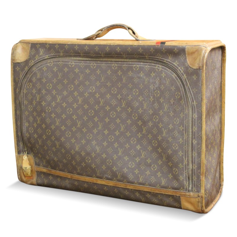 Valise "Louis Vuitton" recouvert de tissu imprimé et de cuir marron. - Moinat - Accessoires de décoration