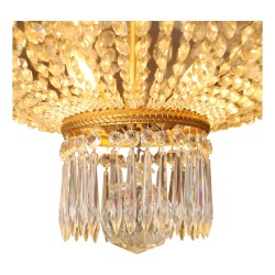 Large basket chandelier in bronze and crystals in the process of …