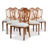 Lot de six chaises en bois de merisier claire. Recouvert d un tissu blanc - Moinat - Chairs