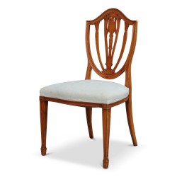Lot de six chaises en bois de merisier claire. Recouvert d un tissu blanc