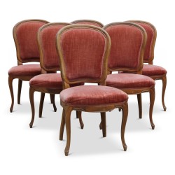 Lot de six chaises Louis Philippe en noyer richement mouluré.