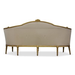 Canapé "Gondole" bois doré, dossier et ceinture cintrés à décor de roses et de feuilles