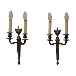 Paire d’appliques de style Louis XVI en métal argenté. 20ème