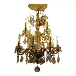 Large 12-light chandelier in bronze and crystals. Late 19th...