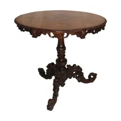 Brienz table in carved wood with marquetry top …
