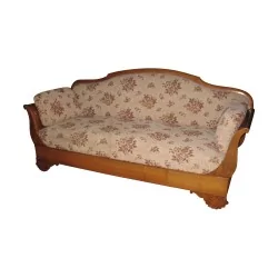 Hirsch sofa in walnut covered in floral fabric. Era