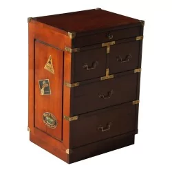 patinated cherry wood travel cabinet with 5 drawers.