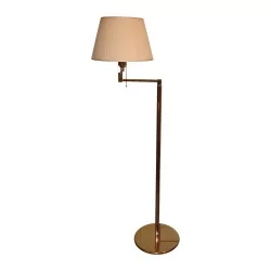 “Arianna” floor lamp in articulated and adjustable brass …