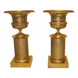 Pair of chased bronze basins.