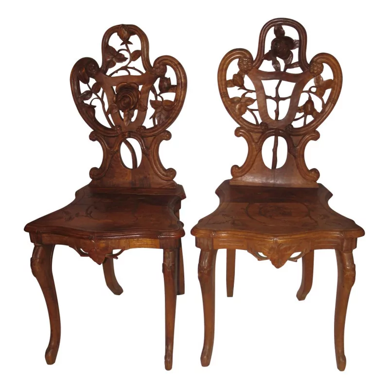 Pair of Brienz chairs in carved wood “Roses”. Swiss, … - Moinat - VE2022/1