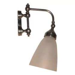 “Rivington” wall lamp in metal with glass globe.