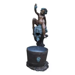 Brunnen „Sitzender Cherub mit Weintraube“, in Bronze …