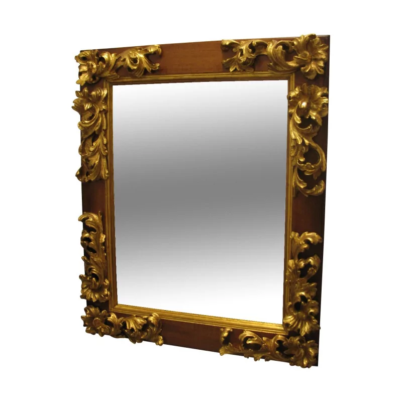 Spiegel mit Rahmen aus Nussbaum und geschnitztem und vergoldetem Holz. - Moinat - Spiegel