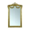 Miroir rectangulaire de style Louis XVI en bois doré. - Moinat - Glaces, Miroirs