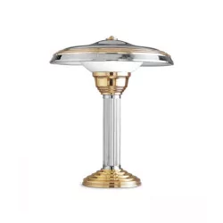 chrome and gold lamp with white opaque glass.
