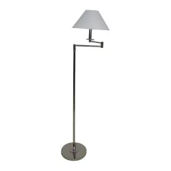 Shiny nickel articulated floor lamp, with white lampshade.
