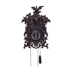 Cuckoo clock from Brienz in carved wood with striking hours,