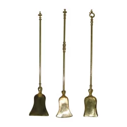 Lot of different wrought iron fireplace shovels and …