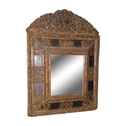 Louis XIV mirror in wood and embossed brass. France, 18th