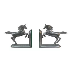 Pair of silver patina bronze bookends. Period 20th …