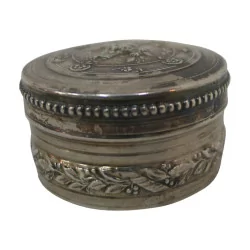Cylindrical box in chased silver with floral decoration on the …