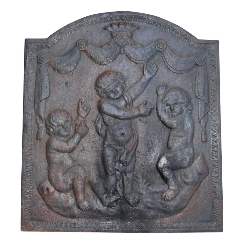 Plaque de cheminée en fonte aux Puttis. France, époque 18ème … - Moinat - Plaques de cheminée